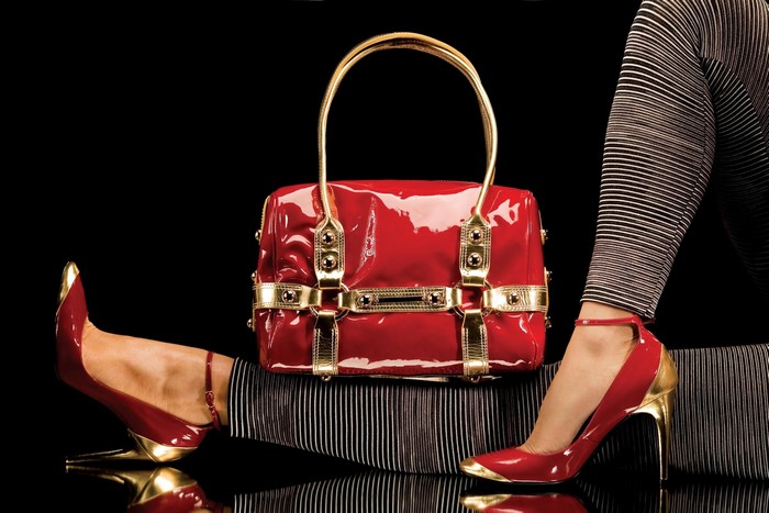 Red patent leather handbag and stilettos