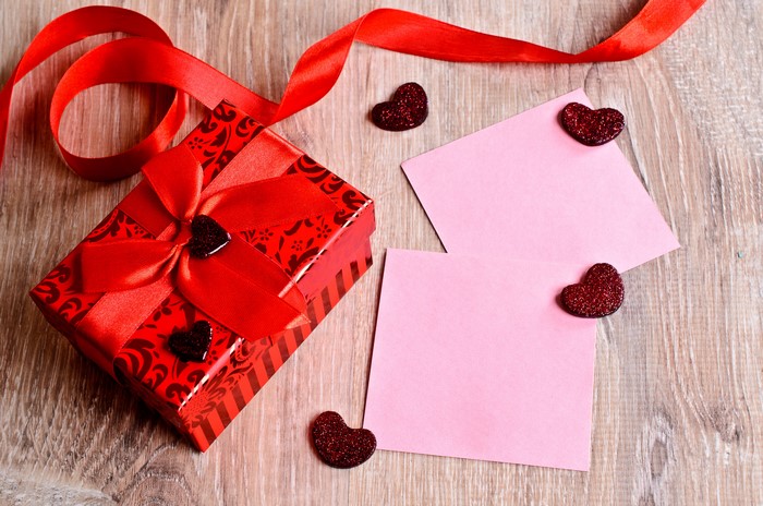 Valentine's Day gift with ribbon and hearts