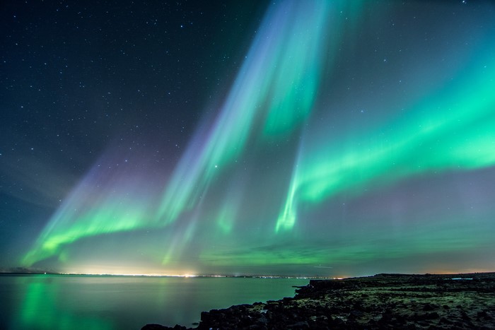 4K Aurora Borealis over Iceland Coast at Night