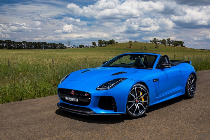 Blue Jaguar F-Type SVR Cabriolet on a Road