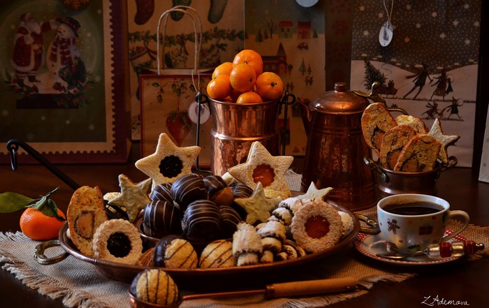 Christmas cookies, mandarines, and coffee in copper pot