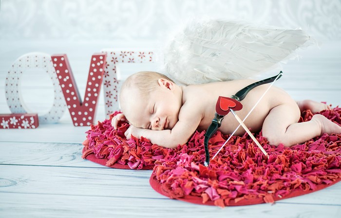 Baby Cupid with Wings and Bow on Valentine's Day