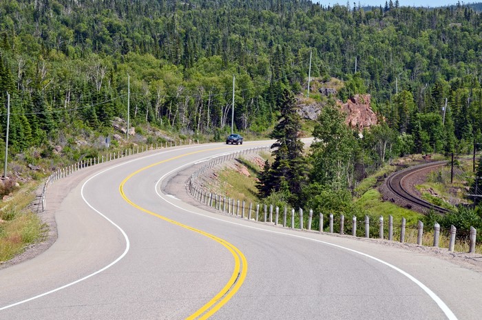 Curving road through a forest in Canada
