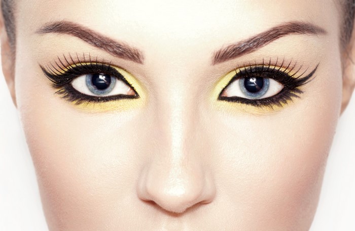 Close-up of a woman's eyes with dramatic makeup