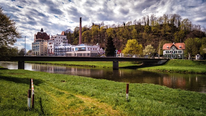 River and bridge with buildings and trees