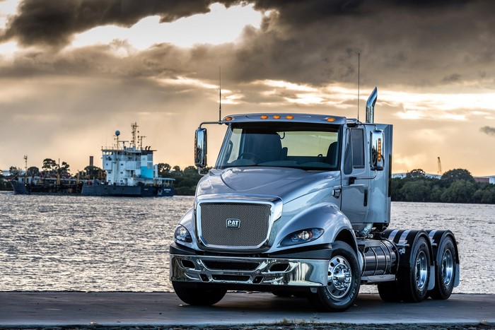 Caterpillar CT610 Tractor by a Waterway