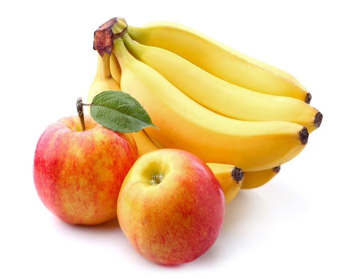 Bananas and apples on a white background