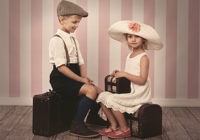 Boy and Girl with Suitcases