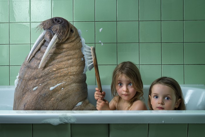 Walrus and two little girls in a bathtub