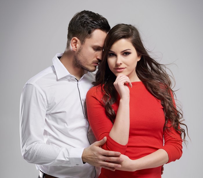Couple in formal shirt and red dress