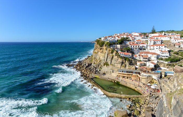 Azenhas do Mar, Portugal Coastline with Houses and Ocean Waves