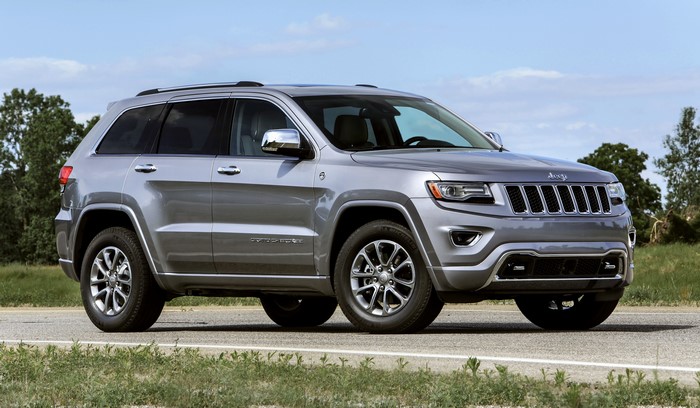 Silver Jeep Grand Cherokee on a Road