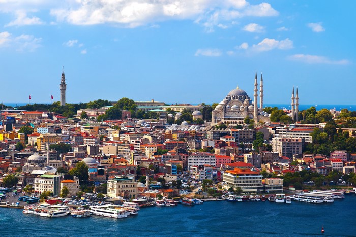 Istanbul cityscape with mosque and tower by the water