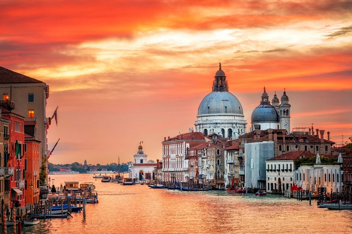 Venice, Italy at sunset with canal and buildings