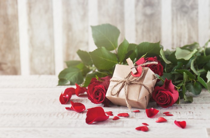 Valentine's Day Gift with Red Roses and Petals