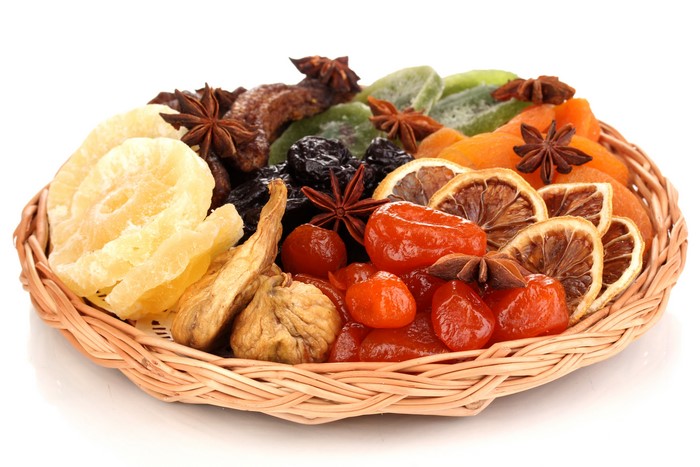 Assortment of Dried Fruits and Star Anise in Wicker Basket
