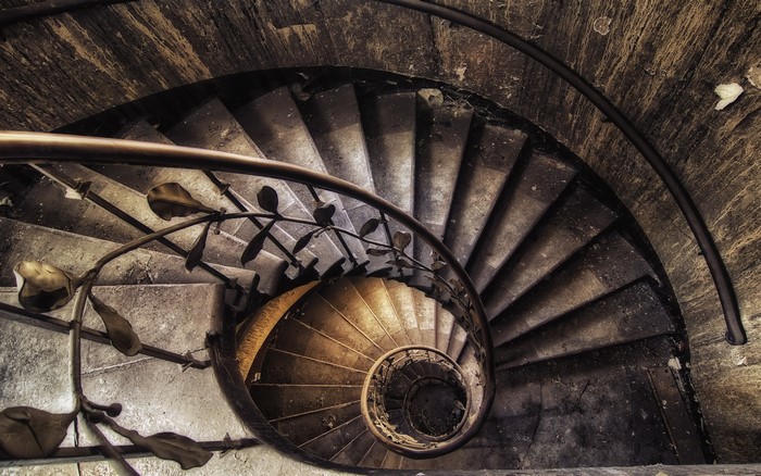 Retro spiral staircase with ornate railing