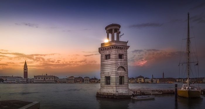 Lighthouse in Venice at sunset with San Giorgio Maggiore