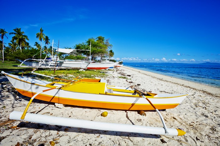 Boats on a tropical beach in the Philippines