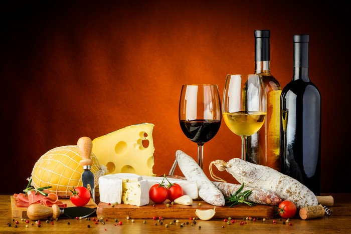 Wine, Cheese, Sausage, and Tomatoes Still-Life