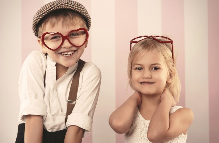 Boy and Girl with Heart Glasses