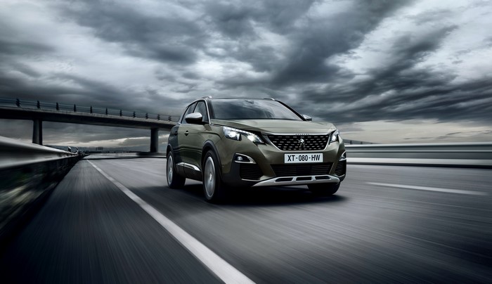 Peugeot 3008 GT driving on a highway