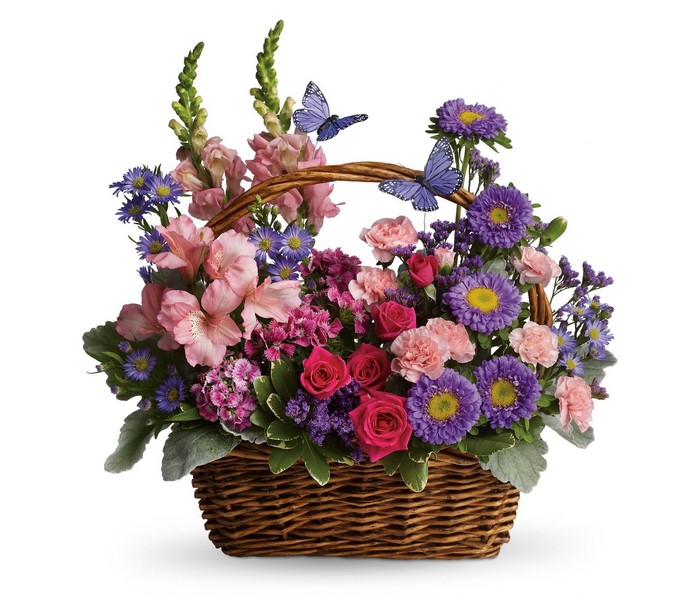 Flower basket with roses, asters, and butterflies
