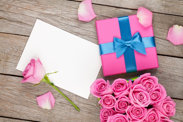 Pink Roses, Gift Box, and Card on Wood