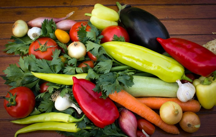 Assortment of Fresh Vegetables on a Wooden Surface