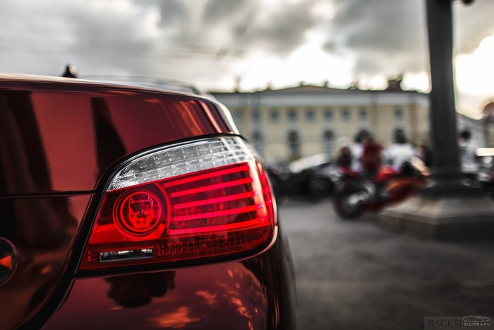 Red BMW E60 taillight with devil emblem