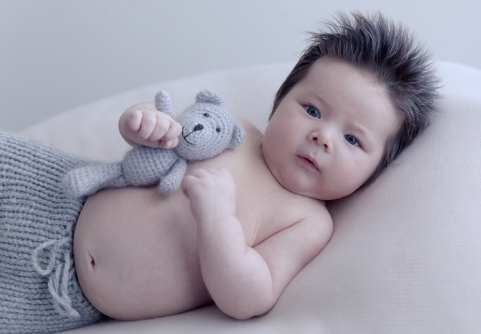 Baby with Teddy Bear and Knitted Pants