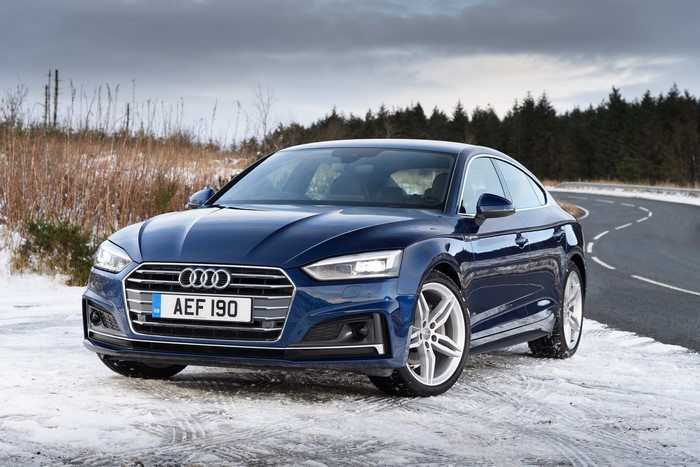 Blue Audi A5 Sportback 2.0 TDI quattro S line on snowy road