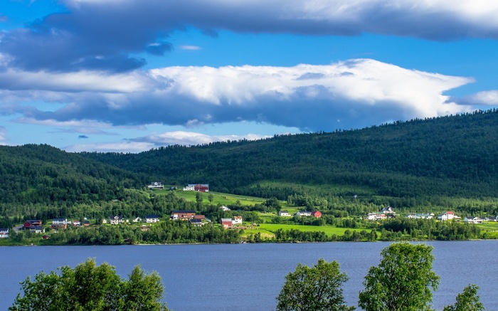Village on a hill overlooking a lake