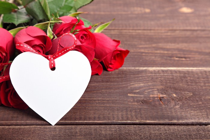 Red Roses with Heart Tag on Wood