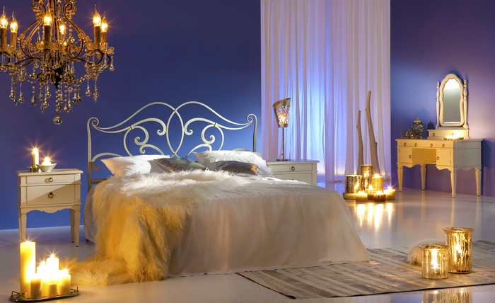 Bedroom with Chandelier and Candles