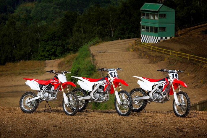 Three Honda CRF Series Motorcycles