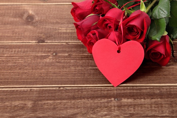 Red Roses with Heart Tag on Wood