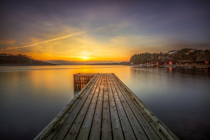 Wooden pier at sunset in Rogaland, Norway