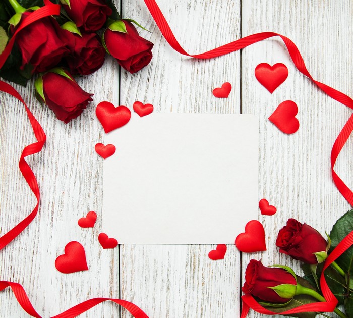 Red Roses, Hearts, Ribbon, and Blank Card on Wood