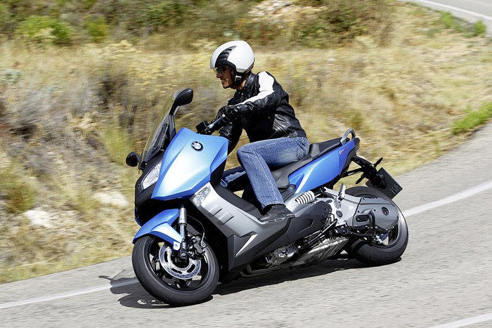 BMW C 600 Sport scooter with rider on a road