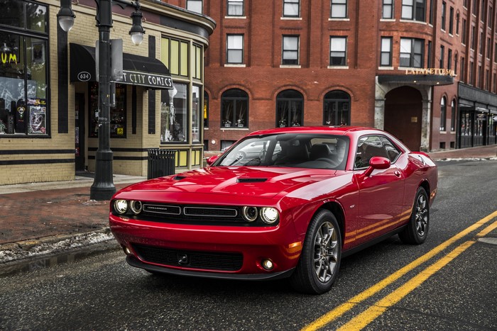 Red 2017 Dodge Challenger GT AWD on street