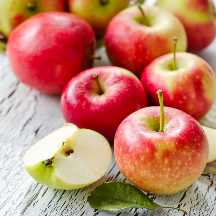 Apples on a wooden surface