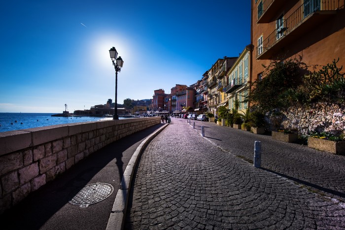 Villefranche sur Mer street with buildings and sea