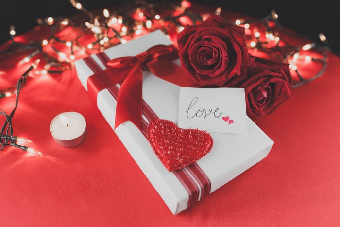 Valentine's Day gift with roses, candle, and lights