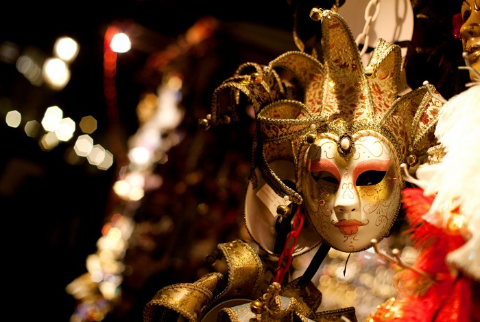 Venetian masks with bokeh lights
