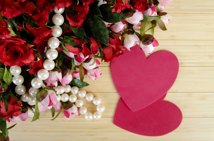 Roses, Pearls, and Hearts on Wood Planks