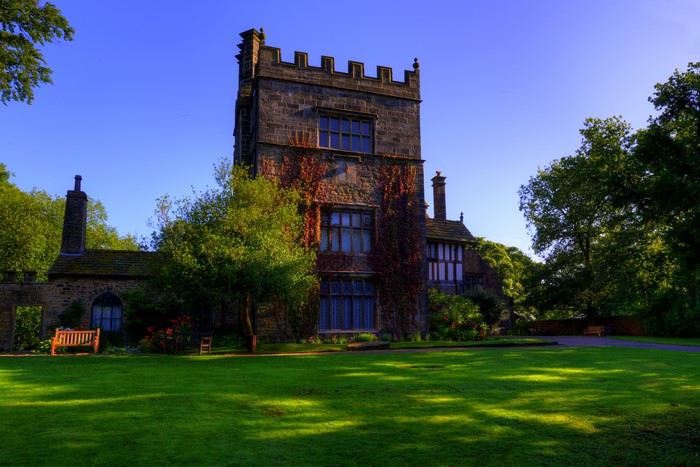 Turton Tower Mansion with Lawn and Trees in England