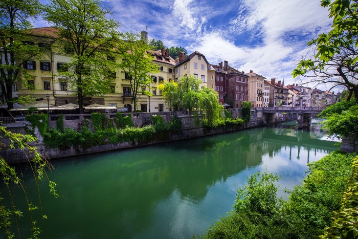 Ljubljana, Slovenia Riverfront with Buildings and Bridge