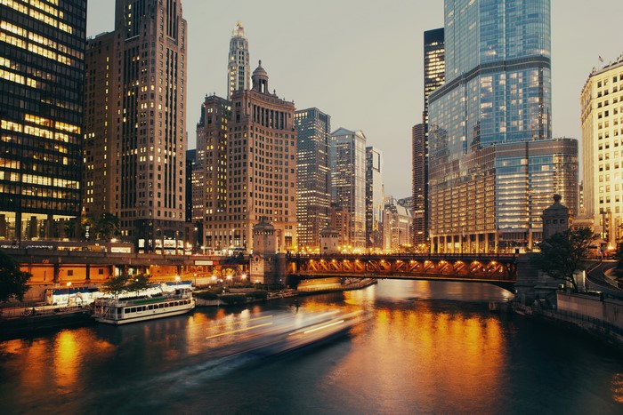 Chicago City Riverfront at Dusk with Skyscrapers and Bridge