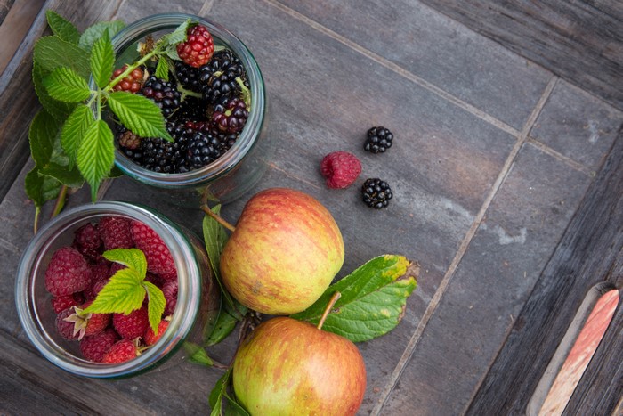 Apples, Raspberries, and Blackberries in Jars